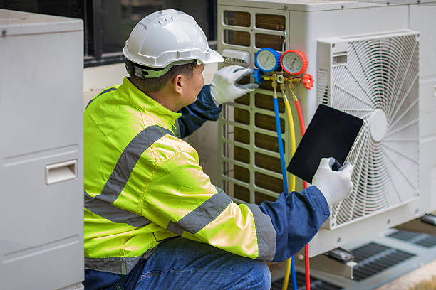 Professional Air Conditioning Repair technician working in Hyde Park, MA